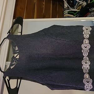 Gray/gunmetal floor length gown with sparkly lace overlay and crystal accents